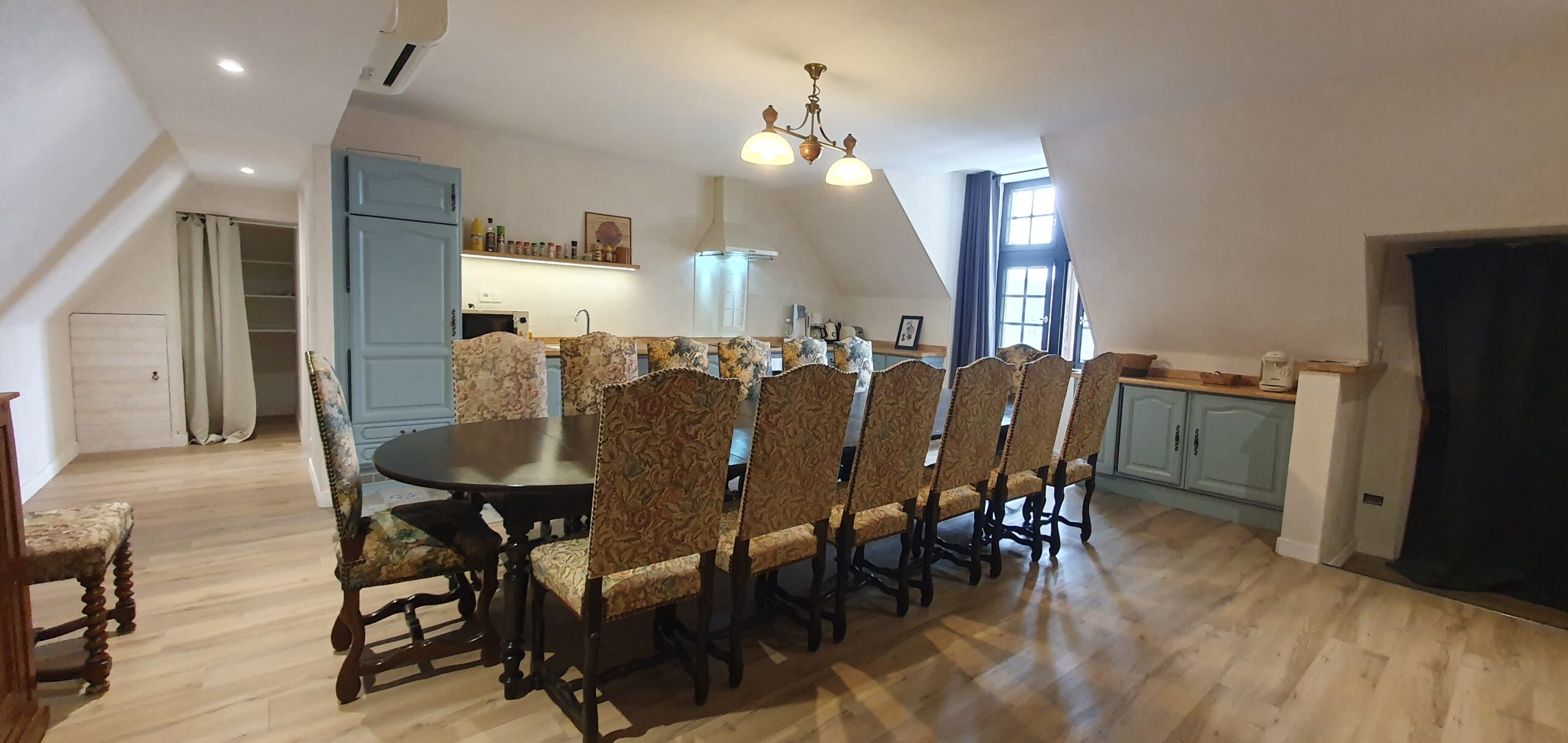 The dining table and kitchen on the second floor